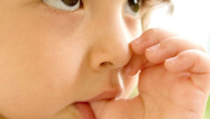 How to stop a child from sucking his or her thumb